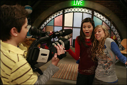 Carly, Sam and Freddie working on another iCarly episode.